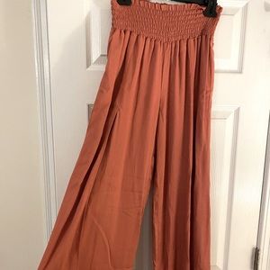 Size M coral palazzo pants with flyaway slits. Great for summer!